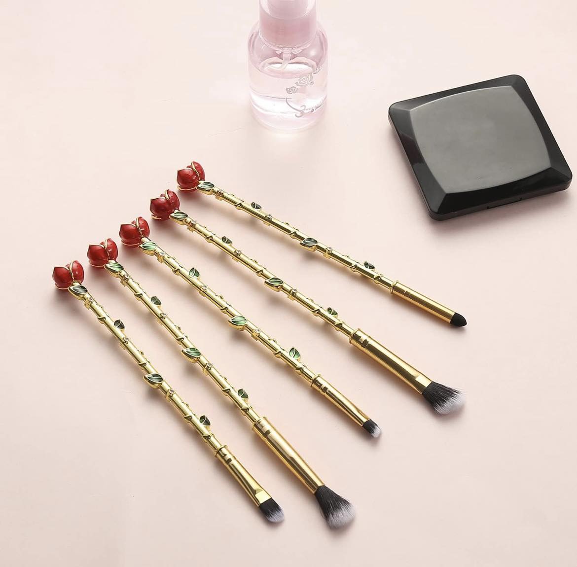 Set brochas de maquillaje rosas